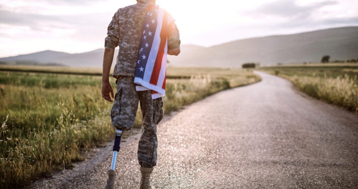 American Amputee Soldier On Road